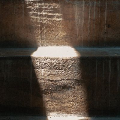 Abstract geometric patterns created by light and shadow.