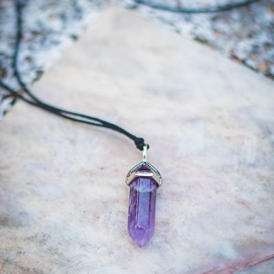 Close-up of a smooth stone reflecting soft light.